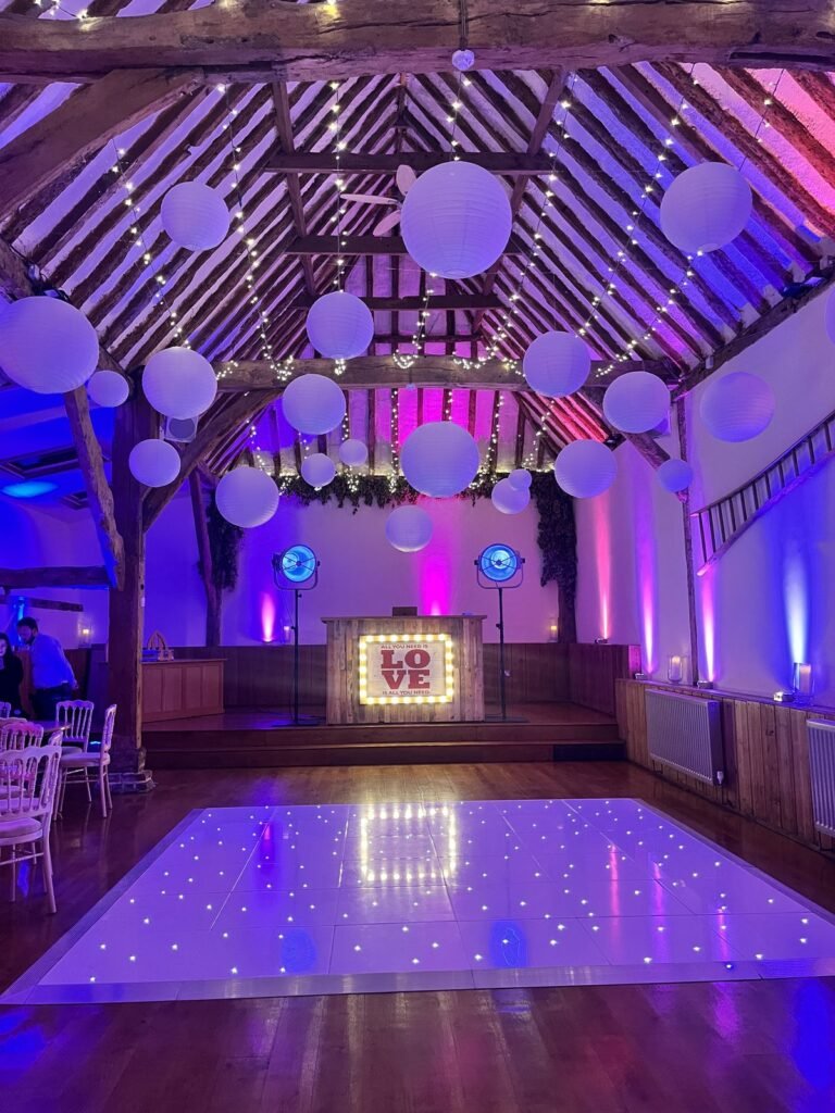 White LED dance floor with uplighting at Winters Barns