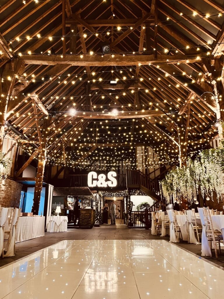 White LED dance floor in the barn at Cooling Castle Barn